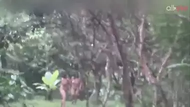 Two hot and sexy Desi aunty bathing in a outdoor under rain together