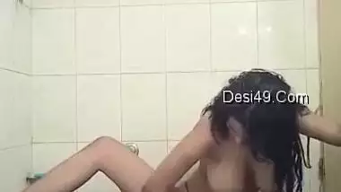 Solo sex video of XXX Indian girl with big natural tits masturbating in shower