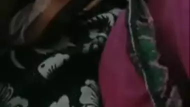 Aunty with perfect pussy lies in bed with legs wide open in XXX video