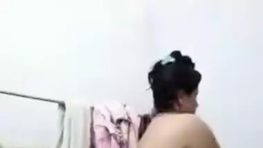 Lonely Indian wife sets camera in the shower room to film some porn