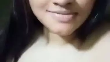 Cute girl opens bra to show sexy boobs to lover