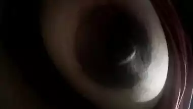 Indian diva lies on back and brings her XXX dark nipples to light