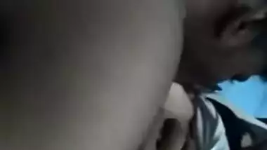 Desi teen lies with naked XXX titties while guy licks her sex nipples