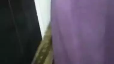 Desi babe takes her colorful sari down and remains naked XXX video