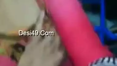 Female in a pink sari allows Indian man to touch her XXX boobs