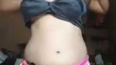 Naked Desi girl with XXX tits and hairy pussy puts clothes on slowly