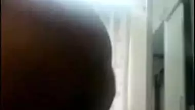 Desi mom with huge melons plays with them on camera in the office