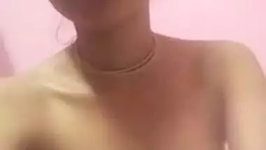 Dollface from India uncovers her thin XXX body and sucks fingers