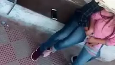 Tempting Desi girl allows sex partner to touch her XXX vagina outdoors