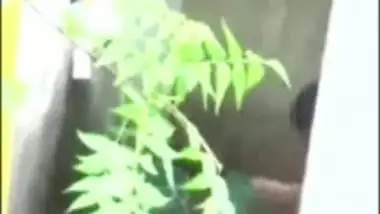 Desi aunty outdoor bath captured secretly on cam by neighbor gets mms online