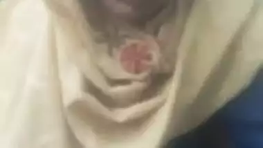 Sexy Desi Dehati beauty shows her shaved XXX pussy in outdoor MMS clip