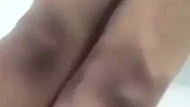 Beautiful desi girl lifting top to reveal sexy boobs