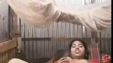 Big-assed Desi whore spreads legs to rub her twat for XXX video