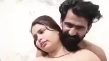 Desi XXX whore allows bearded guy to take her bra off and touch titties