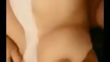 Desi webcam model calls a porn buddy to let him touch big titties