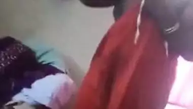 Fatty Indian woman takes off orange dress to join husband for sex