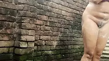 Shower scene of Bangladeshi village girl akhi looking beautiful with sexy dress. Teen hot girl is bathing in the bathroo