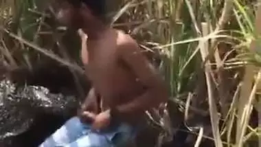 Indian outdoor sex of a guy and his GF in the bushes