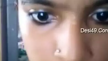 Indian teen with big eyes and pierced nostril shows what she has got