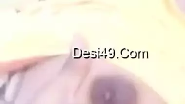 MILF reveals and XXX plays with her cute Desi tits for the camera