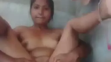 Charming village girl strips to show her pink Desi XXX pussy at home