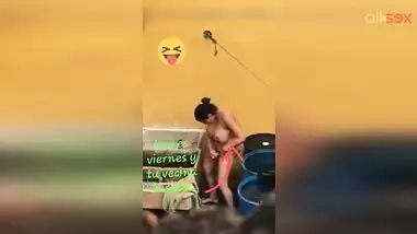 Horny Desi aunty fingering hairy pussy while bathing in a outdoor