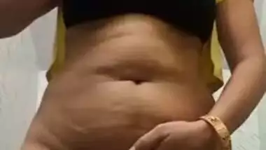 Undressing is a part of the job of the remarkable Desi XXX model