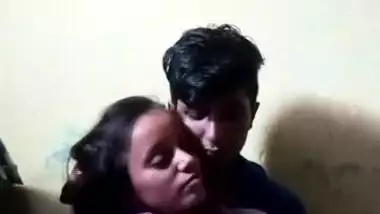 Voluptuous Desi female looks in sex camera while man touches her XXX jugs