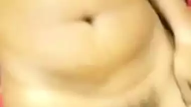 Porn video where the Desi cutie lies on the bed showing private parts