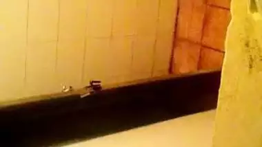 Girl spying on her stepmom having nude bath