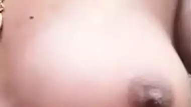 Village XXX wife shows off boobs and snatch in the Desi solo MMS video