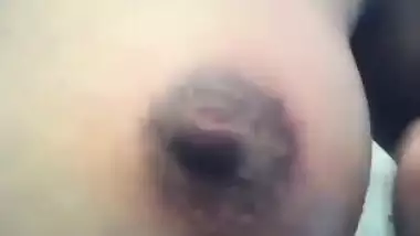 Hot Indian female is home alone so she can expose her boobs for porn