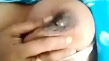 Desi Bhabhi's milking tits exposed in the close-up self-made XXX video