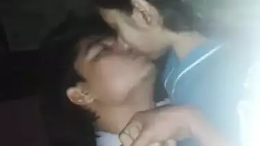 Sleeping Desi babe tries to cover face while sex partner kisses XXX lips