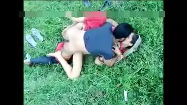 Green grass is perfect for Indian couple to practice porn action on it