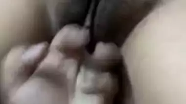 Horny Desi man enjoys and XXX records his wife's pussy fingering