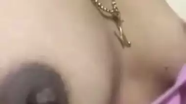 Desi lady has sexy nipples that she can reach with tongue in XXX video