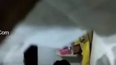 There is a hole in the bathroom and perv films the naked Indian